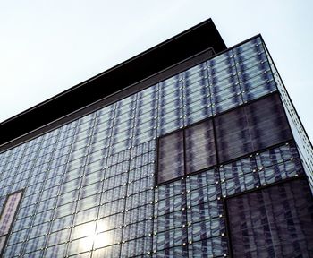 Low angle view of modern building against clear sky