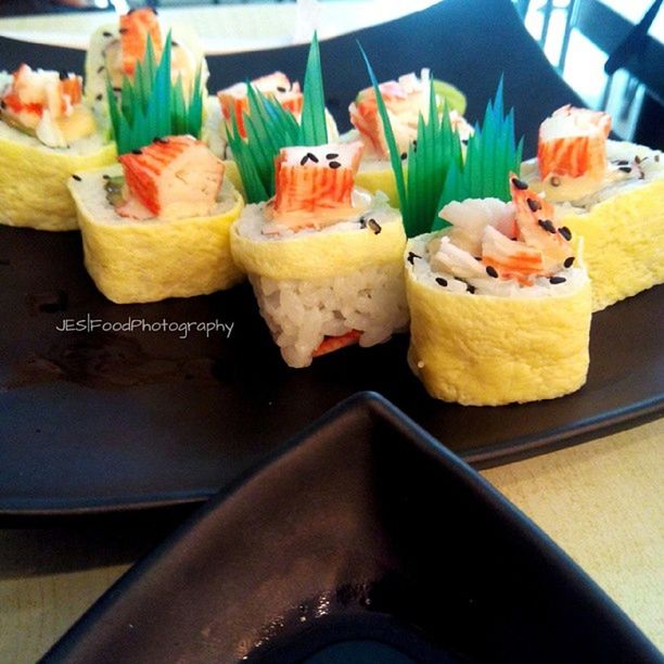 food and drink, food, indoors, freshness, still life, ready-to-eat, healthy eating, indulgence, sweet food, table, variation, close-up, plate, slice, high angle view, meal, in a row, sushi, tray