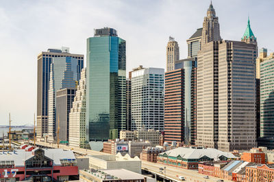 Skyscrapers in city against sky