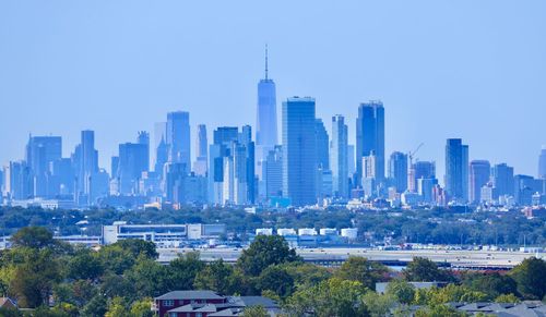 View of buildings in city against sky