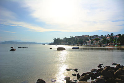 Scenic view of sea against cloudy sky