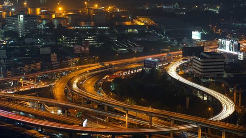 High angle view of illuminated cityscape at night