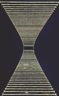 Low angle view of illuminated tunnel