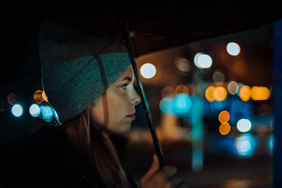 View of illuminated people at night