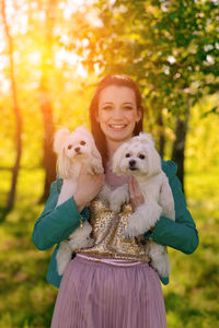 Portrait of woman with dog