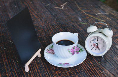 High angle view of coffee cup on table