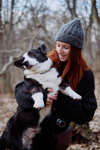 Portrait of woman with dogs