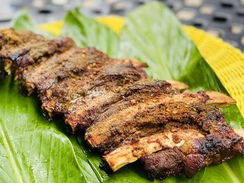 Close-up of meat on barbecue grill