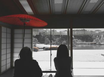 Silhouette people in snow