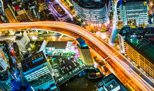 High angle view of light trails on city street