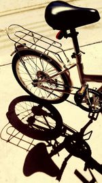 Close-up side view of a cropped bicycle
