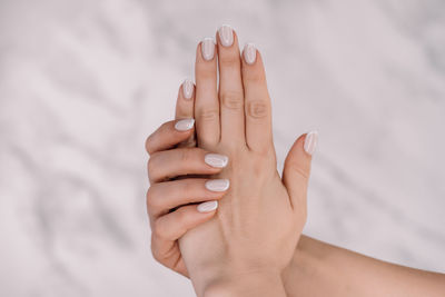 Cropped hand of woman holding hands