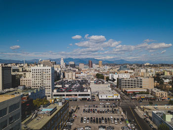 High angle view of buildings in city against sky