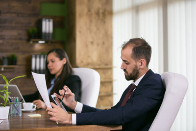 Business colleagues working at office