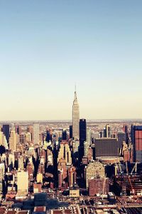 Cityscape against clear sky