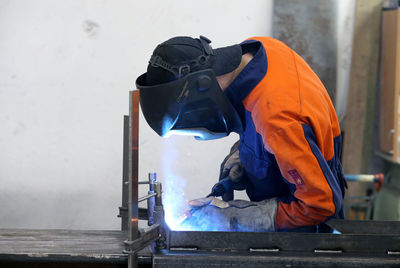 Man working with umbrella