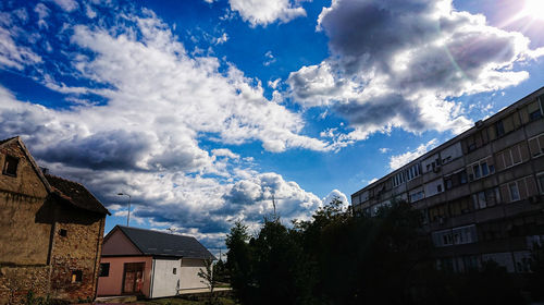 Low angle view of houses against sky