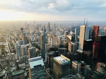 Aerial view of modern buildings in city against sky