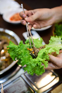 Close-up of hand holding food