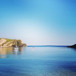 Scenic view of sea against clear sky