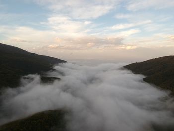 Scenic view of mountains against sky during sunset