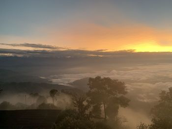 Scenic view of landscape against sky during sunset