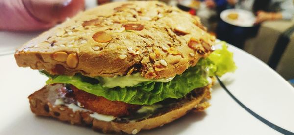 Close-up of burger in plate on table