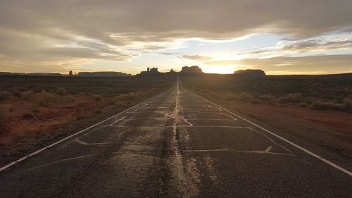 Empty road at sunset