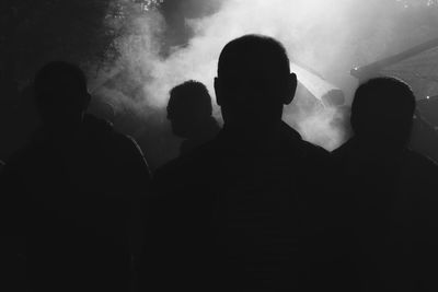 Silhouette people at music concert