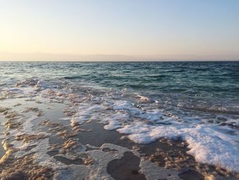 Scenic view of sea against clear sky