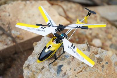 Close-up of toy on rock