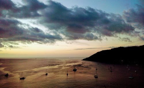 Scenic view of sea against sky at sunset