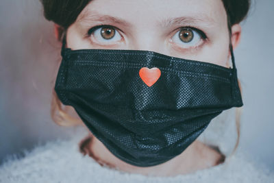 Close-up of woman wearing mask