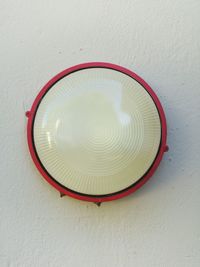 Close-up view of red mirror