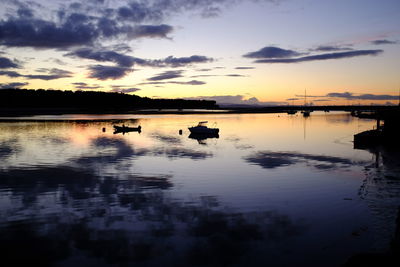 Scenic view of silhouette trees against sky during sunset