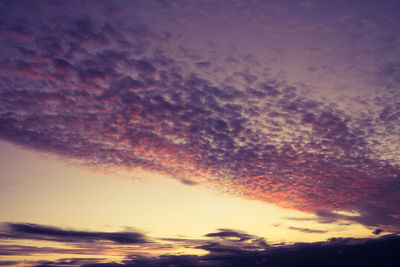 Low angle view of dramatic sky during sunset