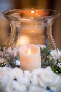 Close-up of tea light candle on table