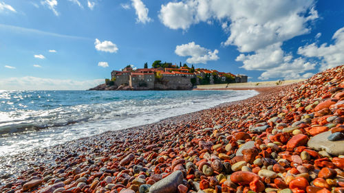 Scenic view of beach against sky