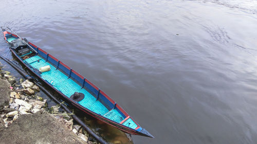 High angle view of boat moored in river