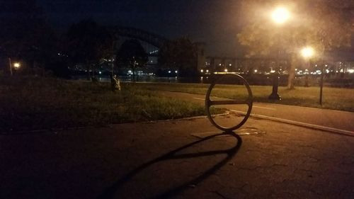 Illuminated street light at night