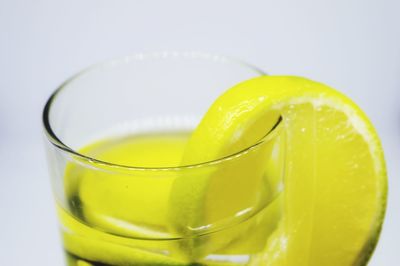 Close-up of lemon against white background