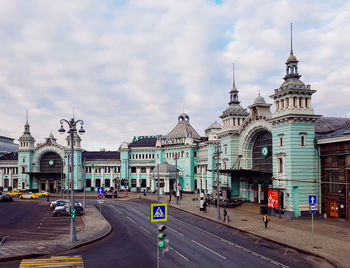 View of buildings against cloudy sky