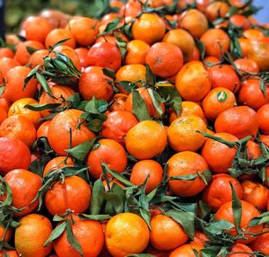 Full frame shot of oranges at market stall