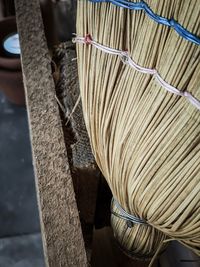 High angle view of various tied up on wood