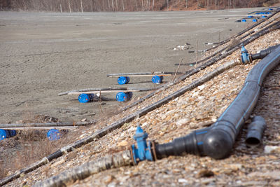 Decanting lake pipe installation treatment with lime and gypsum for purification of water 