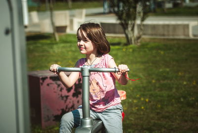 Small girl playing on the playground