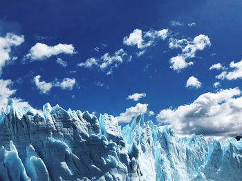 Scenic view of snow covered landscape against sky