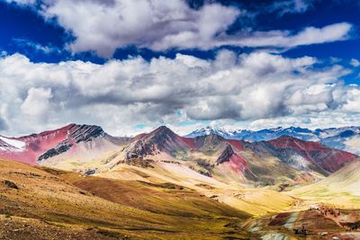 View of mountain range against cloudy sky