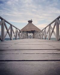 View of bridge against cloudy sky