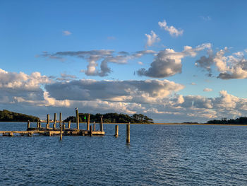 Pier on sea against sky